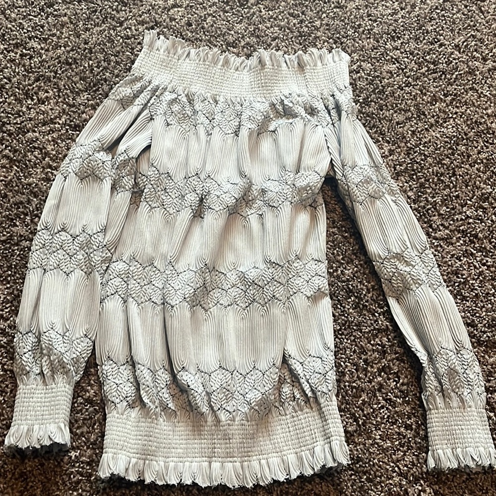 Light blue woman’s lace blouse